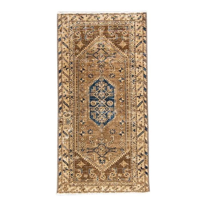 1960s Handmade Blue Tribal Wool Rug 3'3 x 6'5: 1960s Handmade Blue Tribal Wool Rug 3'3 x 6'5 Enhance your space with this beautiful 1960s Vintage Tribal hand-knotted wool rug, featuring a striking blue field complemented by brown and tan accents. 