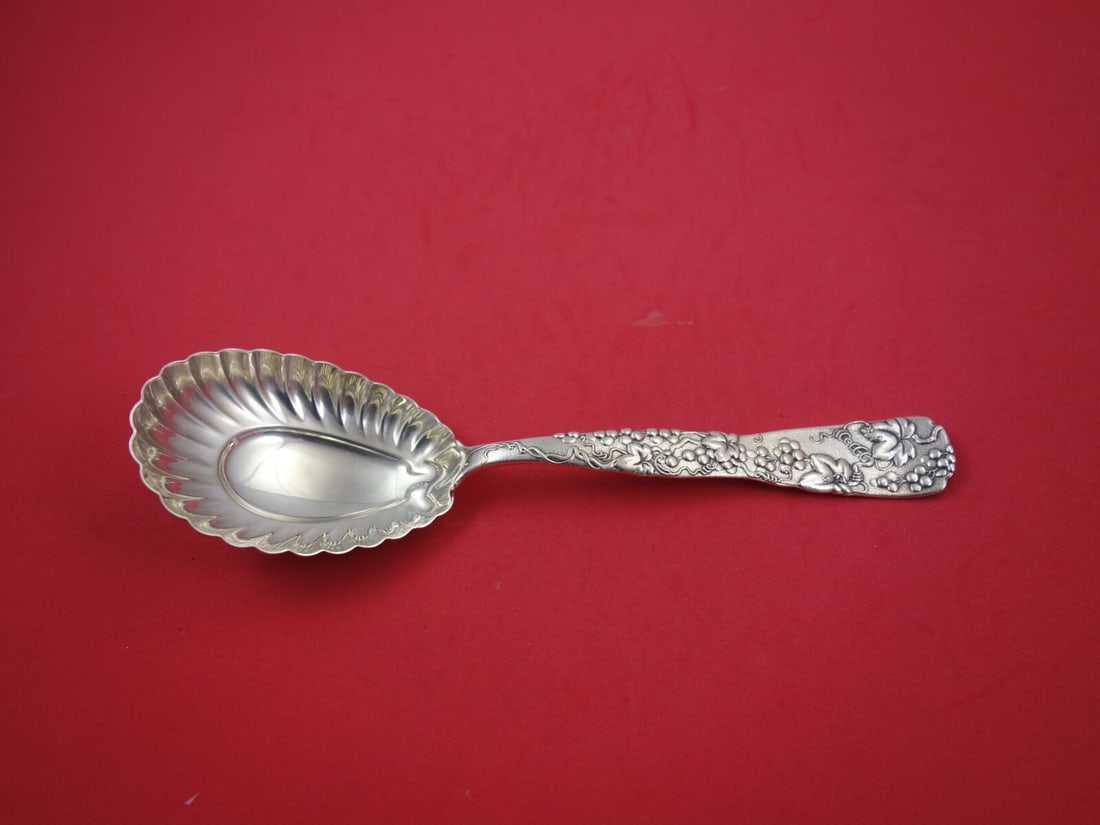 Tiffany & Co. Vine Sterling Silver Berry Spoon Berlin Collection 9.5 In: Tiffany & Co. Vine Sterling Silver Berry Spoon Berlin Collection 9.5 In This exquisite serving spoon from Tiffany & Co. features the renowned "Vine" pattern, showcasing a beautifully crafted sterling 