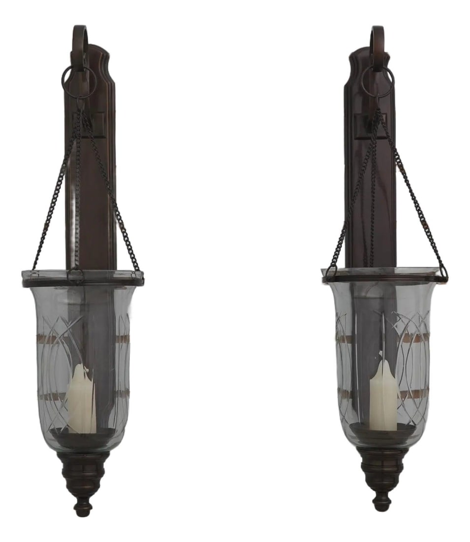 Set of Two Bronze Candle Sconces with Etched Crystal Shades: Set of Two Bronze Candle Sconces with Etched Crystal Shades This pair of wall-mounted candelabras from the 1980s features a traditional design crafted from high-quality bronze or brass. Each piece is 