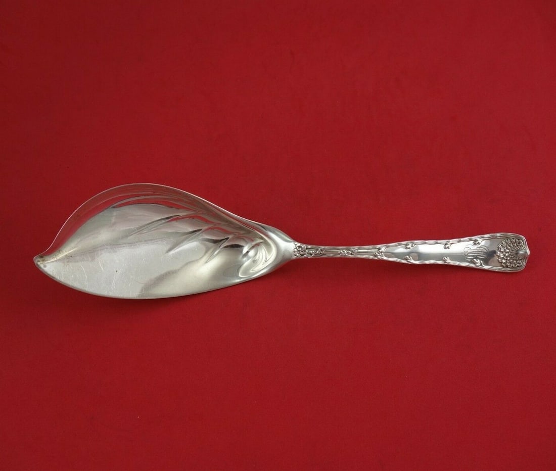 Tiffany & Co Wave Edge Sterling Silver Ice Cream Server 11.5": Tiffany & Co Wave Edge Sterling Silver Ice Cream Server 11.5" Indulge in the elegance of the Wave Edge Ice Cream Server by Tiffany & Co. This exquisite piece, crafted from sterling silver, showcases t