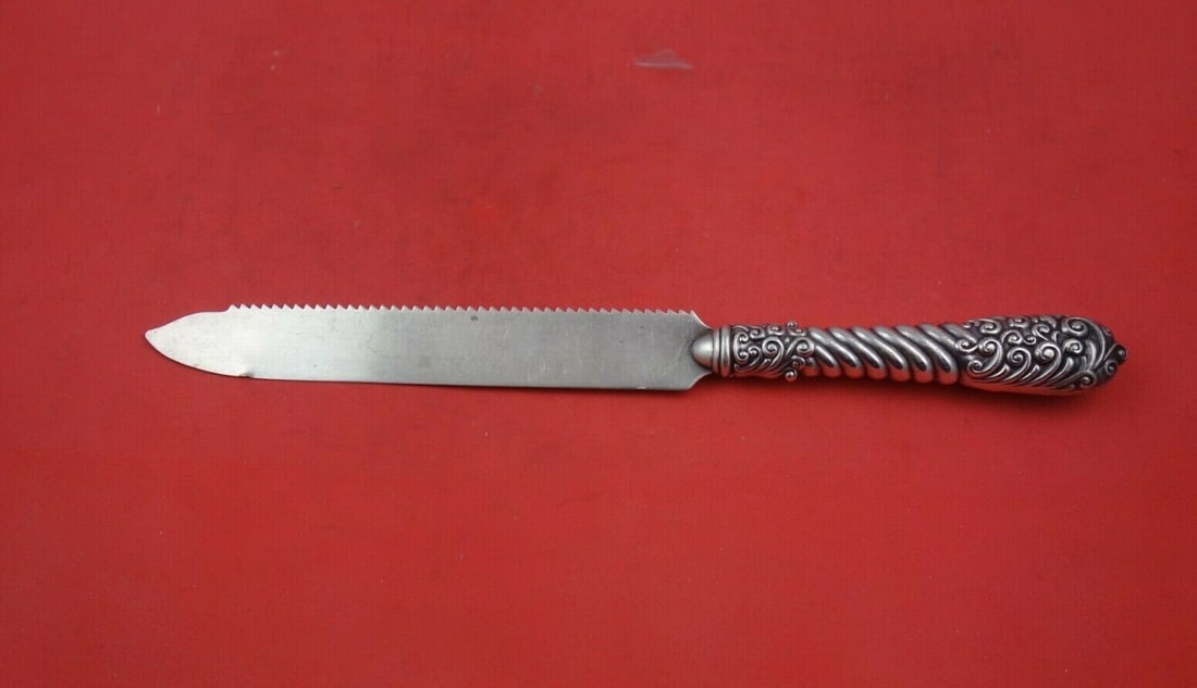 Gorham Sterling Silver Cake Saw Number 650 Vintage 9 3/4 Inch: Gorham Sterling Silver Cake Saw Number 650 Vintage 9 3/4 Inch Presenting a vintage Gorham sterling silver cake saw, featuring a hollow handle and measuring 9 3/4". This exquisite piece is designed in 