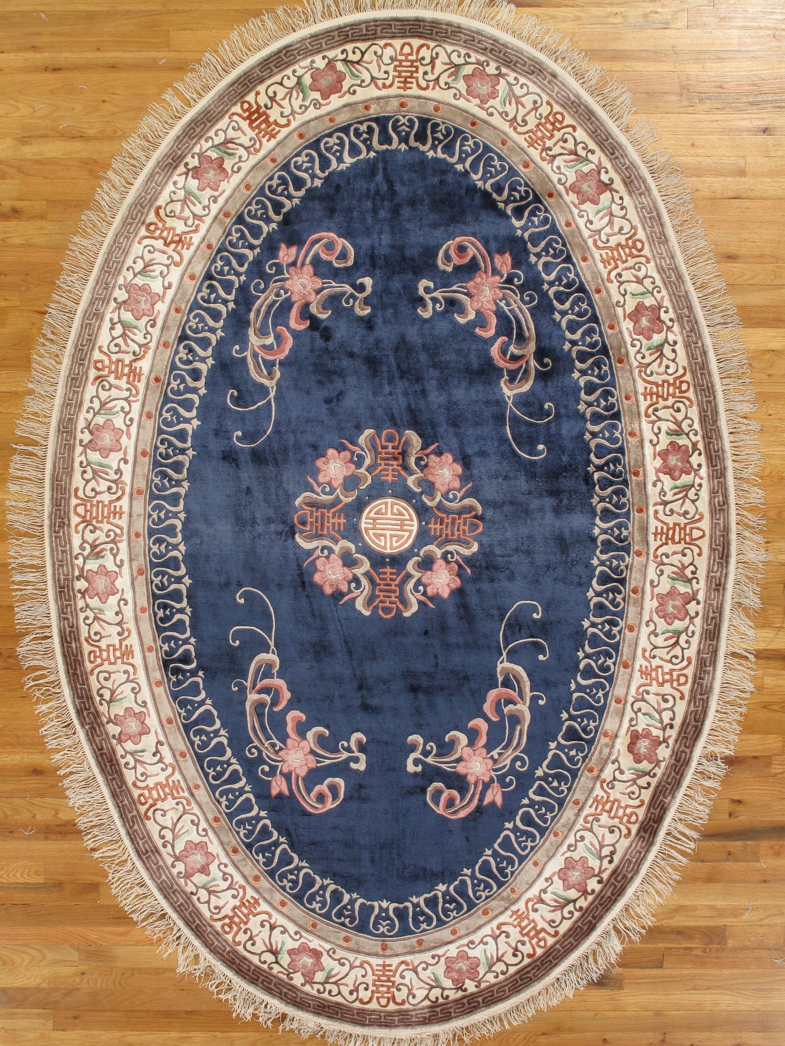 6 x 9 Oval Hand-knotted Chinese Art Deco Wool Rug: 6 x 9 Oval Hand-knotted Chinese Art Deco Wool Rug Free continental US Shipping This 6 x 9 oval hand-knotted Chinese Art Deco rug showcases a harmonious blend of traditional Chinese artistry and modern