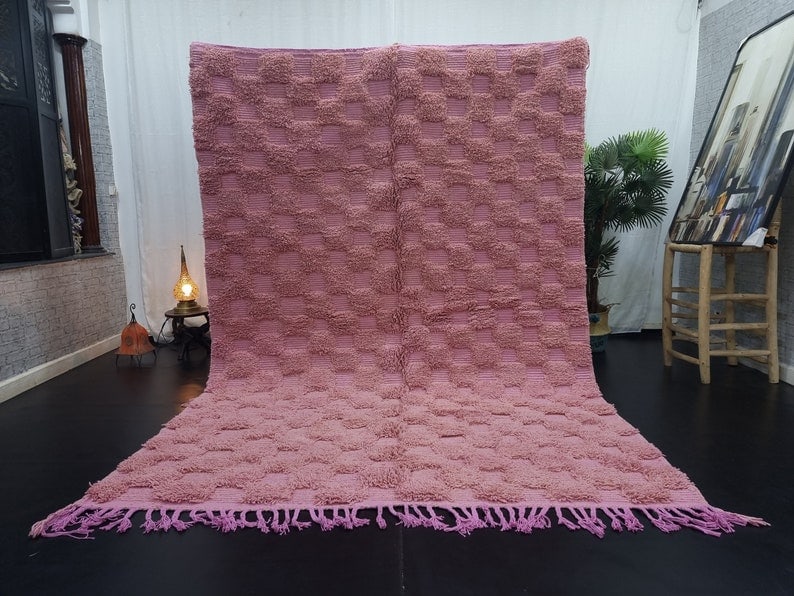 Handmade Moroccan Berber Wool Rug Soft Pink 9.84 x 6.56 Feet: Handmade Moroccan Berber Wool Rug Soft Pink 9.84 x 6.56 Feet Enhance your living space with this exquisite Soft Pink Engraved Handmade Moroccan Berber Wool Area Rug. Meticulously handwoven in the Atla