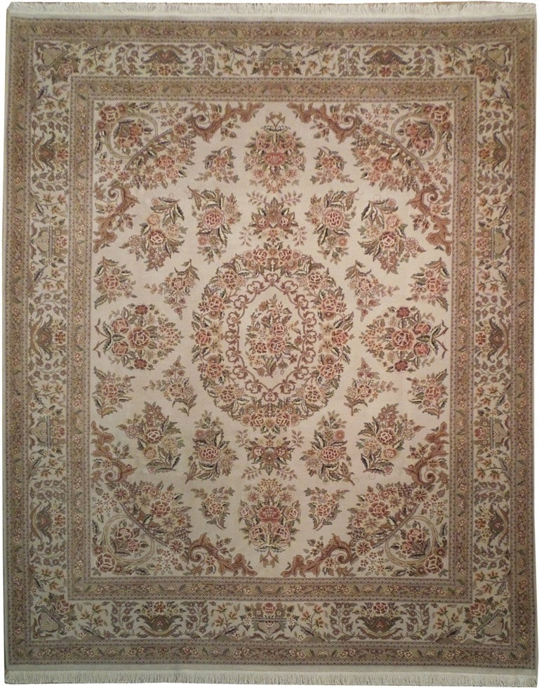 8 x 9.6 Persian Tabriz Hand Knotted Wool Silk Rug: 8 x 9.6 Persian Tabriz Hand Knotted Wool Silk Rug Free continental US Shipping This 8 x 9.6 foot Persian Tabriz rug is hand-knotted in Tabriz, Iran, using high-quality wool and silk. It features class