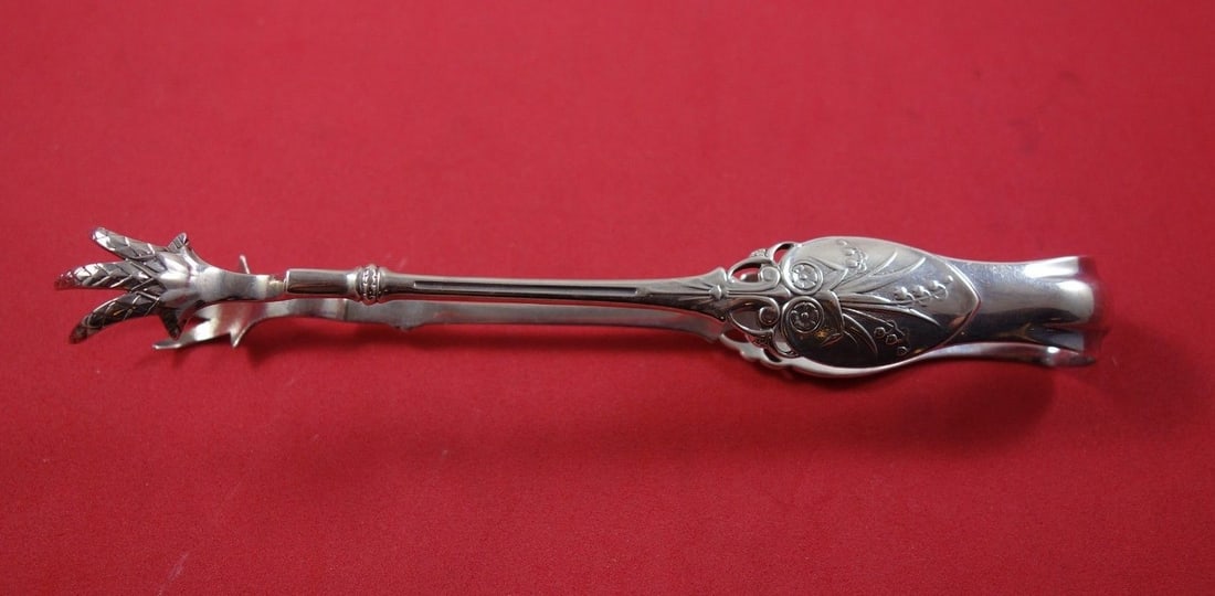 Gorham Lily aka 88 Sterling Silver Sugar Tong Double Claw 6 1/8": Gorham Lily aka 88 Sterling Silver Sugar Tong Double Claw 6 1/8" Enhance your dining experience with the exquisite Lily aka 88 sugar tong, crafted by Gorham in the late 19th century. Made from high-qu