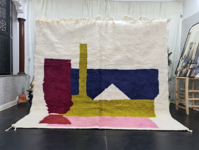 Moroccan Handwoven Colorful Rug 100% Sheep Wool 6.56x6.56 Feet: Moroccan Handwoven Colorful Rug 100% Sheep Wool 6.56x6.56 Feet This lovely authentic rug is handwoven in the Atlas Mountains by skilled local Berber women weavers using traditional tools. Crafted from