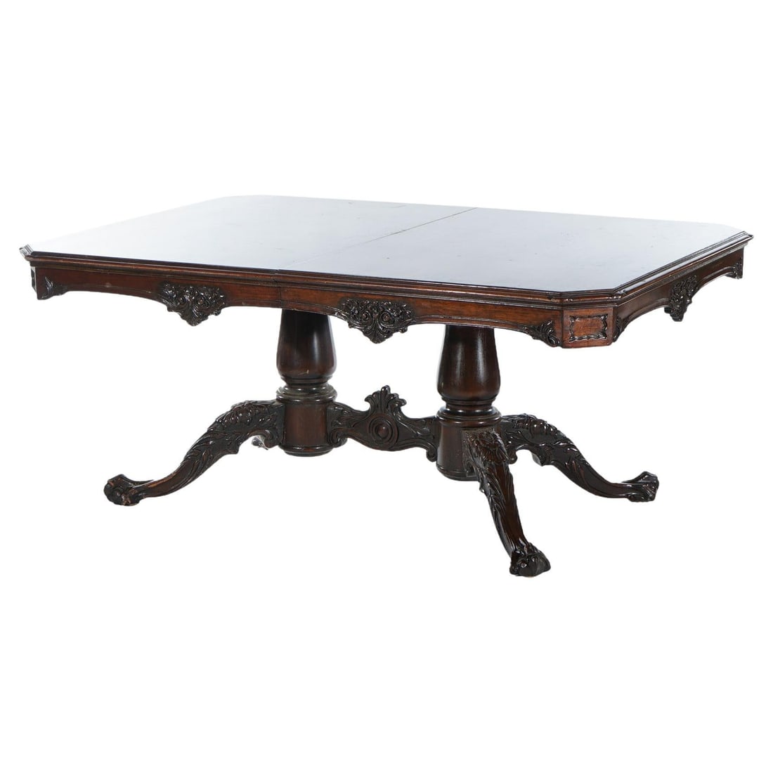 Chippendale Mahogany Double Pedestal Dining Table Circa 1930: Chippendale Mahogany Double Pedestal Dining Table Circa 1930 This exquisite antique Chippendale style dining table, crafted from rich mahogany, showcases the elegance and artistry of the early 20th ce