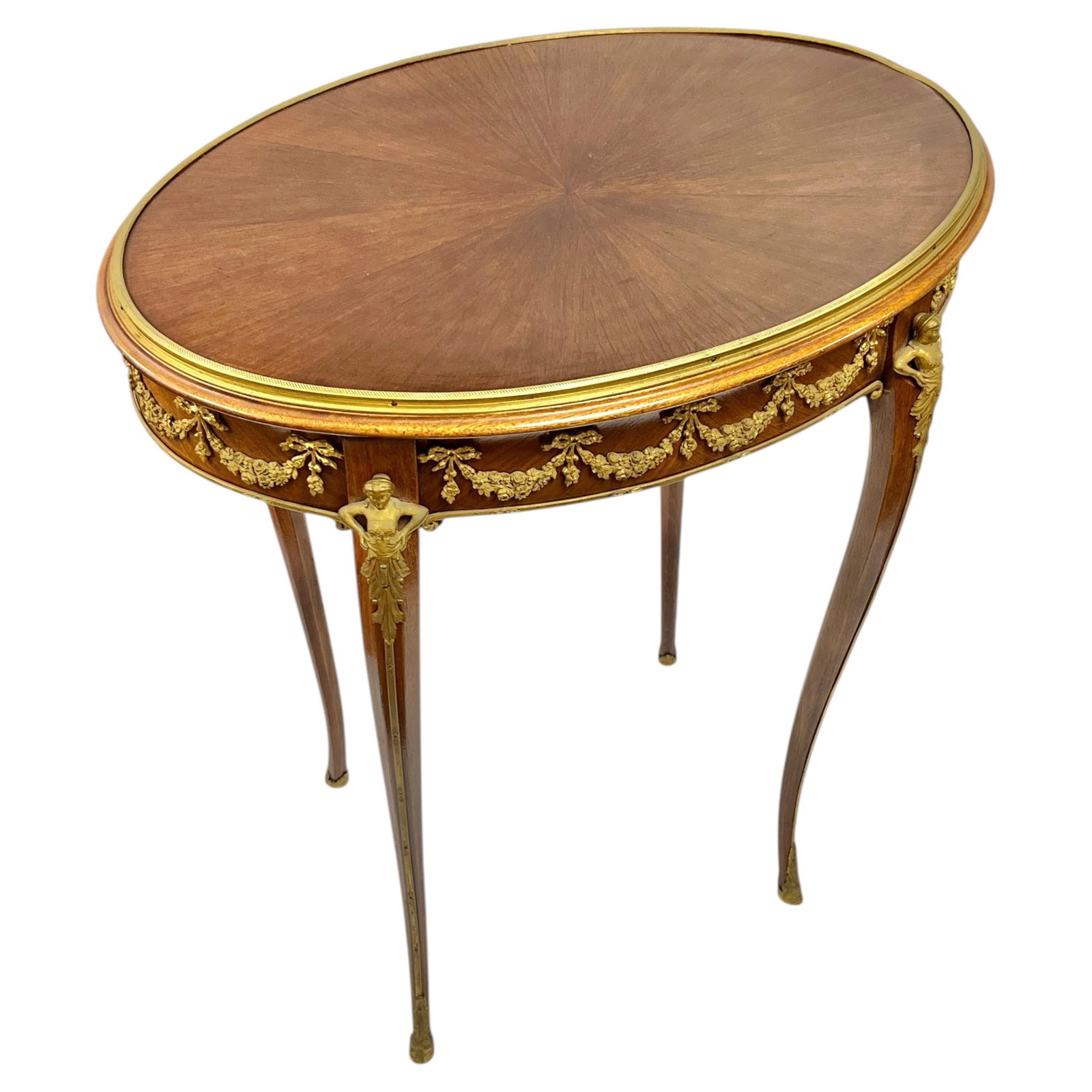 French Louis XV Gilt Bronze Mounted Oval Side Table with Drawer: French Louis XV Gilt Bronze Mounted Oval Side Table with Drawer This antique French side table from the late 19th century features an elegant oval shape in the Louis XV/XVI style. Crafted with finely 