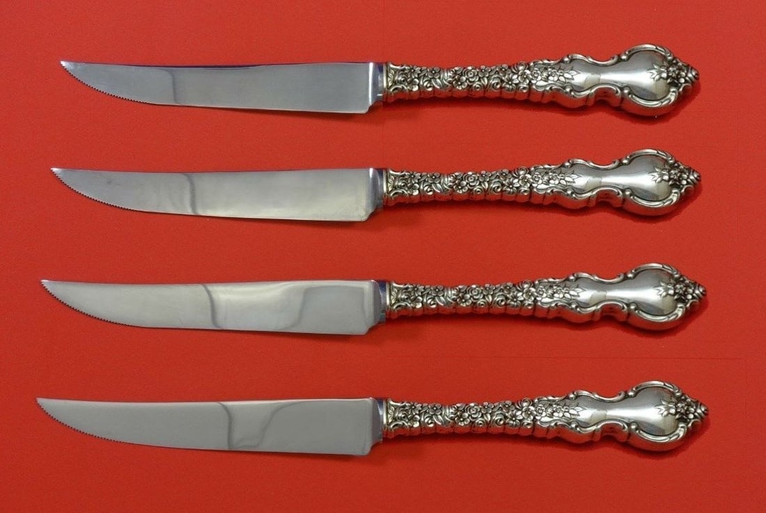 International Silver Du Barry 4pc Steak Knife Set 8.5 Inch: International Silver Du Barry 4pc Steak Knife Set 8.5 Inch Introducing the Du Barry Steak Knife Set, crafted by International Silver. This elegant 4-piece set features knives designed with a sterling 