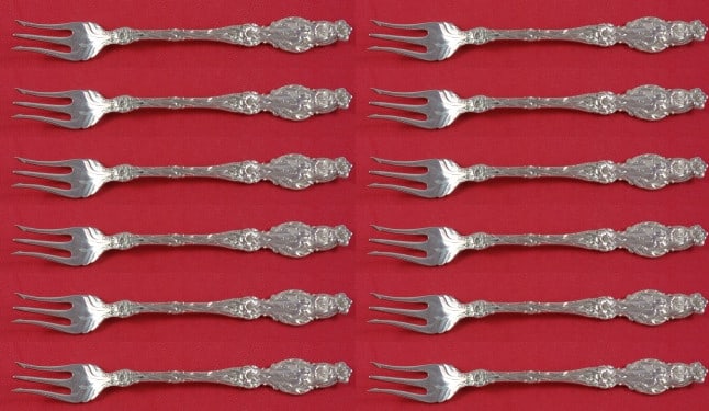 Whiting Lily Sterling Silver Cocktail Fork Set 12 pieces 5 7/8": Whiting Lily Sterling Silver Cocktail Fork Set 12 pieces 5 7/8" Enhance your dining experience with this exquisite 12-piece cocktail fork set from the renowned Whiting brand, featuring the elegant Lil
