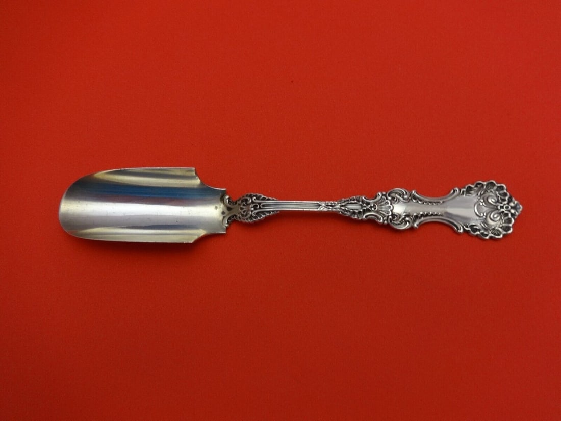 Whiting Pompadour Sterling Silver 6 Inch Cheese Scoop Serving Piece: Whiting Pompadour Sterling Silver 6 Inch Cheese Scoop Serving Piece This exquisite cheese scoop from the Pompadour pattern by Whiting is a stunning example of 19th-century craftsmanship. Crafted from 