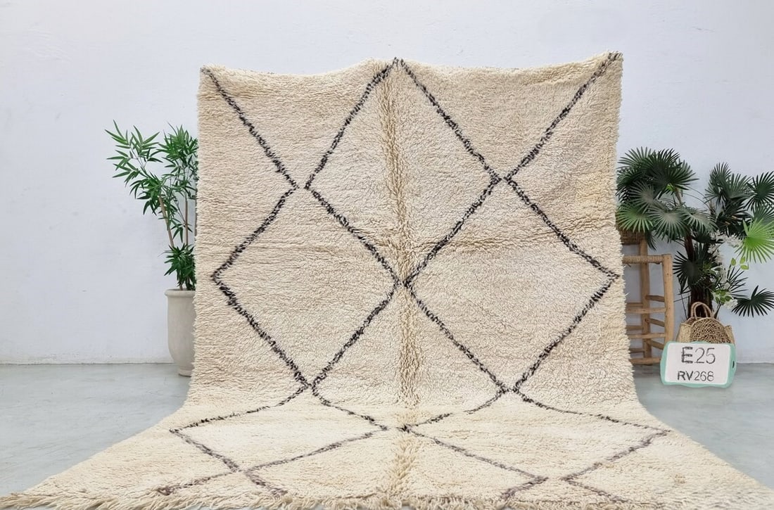 Authentic Berber Handmade Wool Rug 9.84 x 6.56 feet Morocco: Authentic Berber Handmade Wool Rug 9.84 x 6.56 feet Morocco Discover the charm of this Bohemian Authentic Berber Handmade Wool Rug, meticulously handwoven by skilled local Berber women weavers in the 