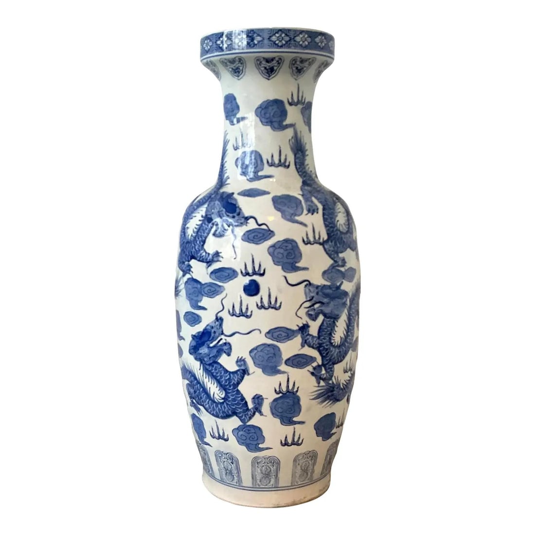 Blue White Porcelain Chinoiserie Dragon Vase 24 Inch: Blue White Porcelain Chinoiserie Dragon Vase 24 Inch This large vintage Chinoiserie vase is crafted from blue and white porcelain and features an intricate design of imperial dragons among stylized ru