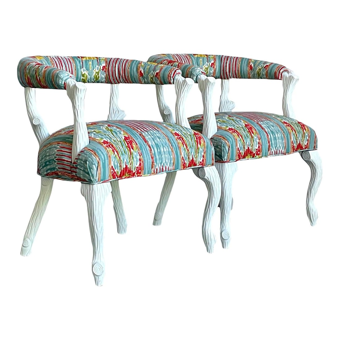 Pair of Faux Bois Barrel Lounge Chairs in Clarence House Mazar Sharif Ikat Fabric: Pair of Faux Bois Barrel Lounge Chairs in Clarence House Mazar Sharif Ikat Fabric This pair of vintage Regency lounge chairs features artfully carved faux bois wooden frames finished in off-white lacq