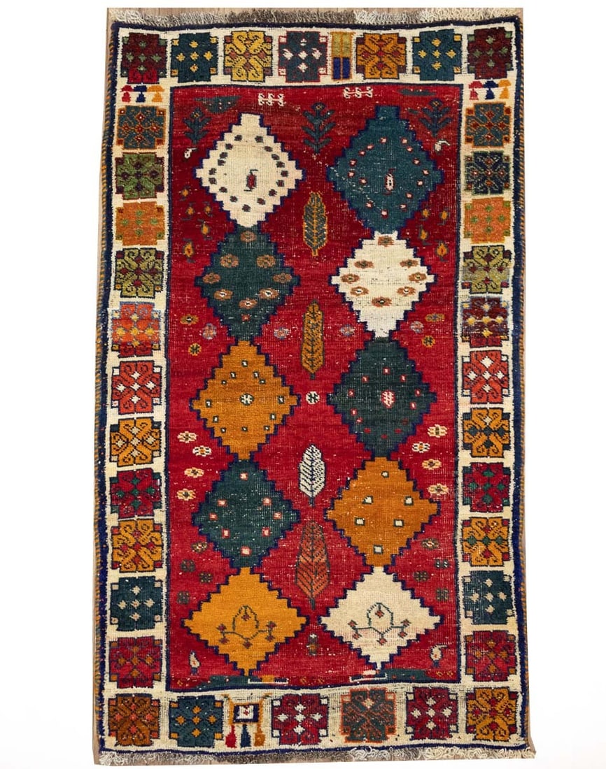 Hand-Knotted Wool Tribal Geometric Area Rug 3'7 x 6'3: Hand-Knotted Wool Tribal Geometric Area Rug 3'7 x 6'3 This semi-antique handmade rug features a striking tribal geometric design, expertly hand-knotted from wool. With a vibrant palette of red, cream,
