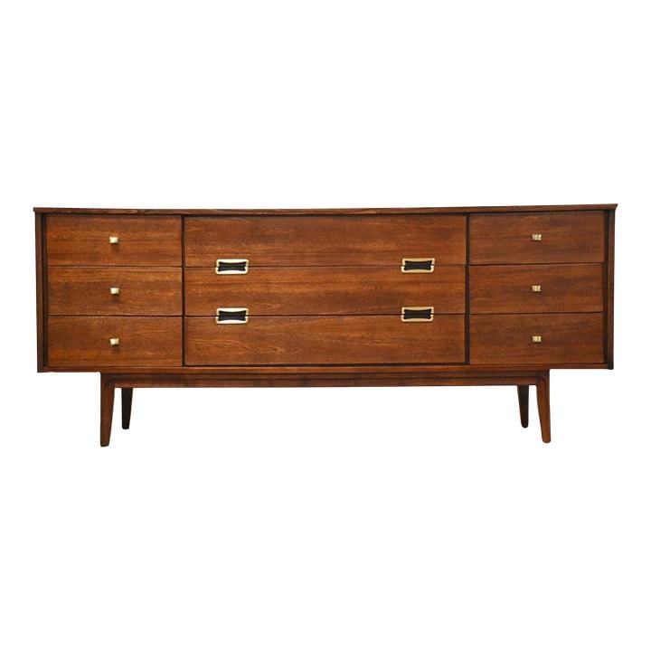 Mid Century Modern Ash Dresser with Brass Pulls 72x30: Mid Century Modern Ash Dresser with Brass Pulls 72x30 This stunning mid-century modern dresser features a rich walnut color with a beautifully refined ash grain. The dresser is equipped with elegant b