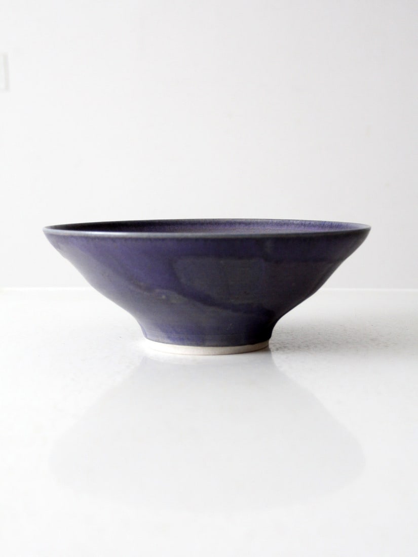 Signed Purple Glazed Studio Pottery Serving Bowl 10.75 Inch: Signed Purple Glazed Studio Pottery Serving Bowl 10.75 Inch Discover the charm of this vintage studio pottery bowl, showcasing a stunning rich purple glaze and elegantly flared sides. Handcrafted by t