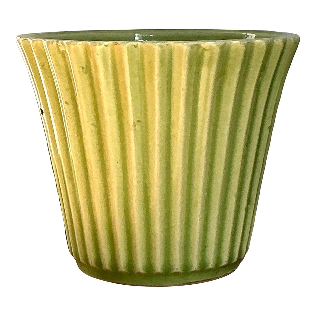 French Pleated Glazed Ceramic Vase in Celadon Green 5 Inch: French Pleated Glazed Ceramic Vase in Celadon Green 5 Inch This vintage French ceramic vase features a softly pleated or fluted texture with a delicate scalloped rim, finished in a glossy pastel lime 