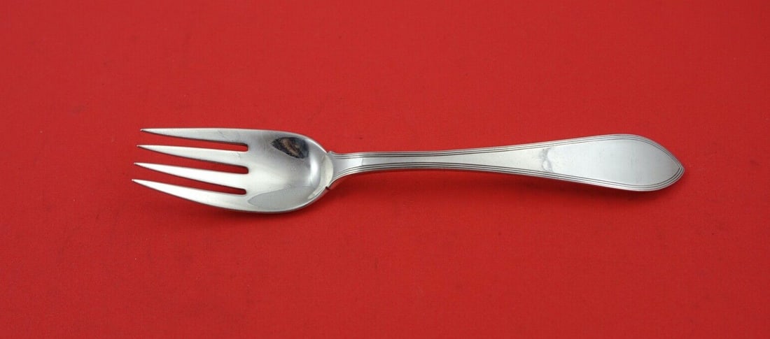 Tiffany & Co Reeded Edge Sterling Silver Fish Fork 6 5/8": Tiffany & Co Reeded Edge Sterling Silver Fish Fork 6 5/8" This exquisite fish fork from Tiffany & Co. features the elegant Reeded Edge pattern, crafted from high-quality sterling silver. Measuring 6 5