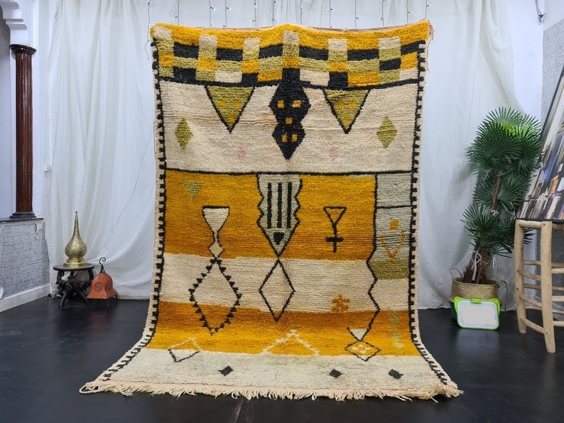 Handmade Yellow Wool Rug 8 x 5 Feet Moroccan Berber Design: Handmade Yellow Wool Rug 8 x 5 Feet Moroccan Berber Design Enhance your living space with this beautiful handmade yellow wool rug, featuring a unique custom design. Expertly crafted by local Berber wo