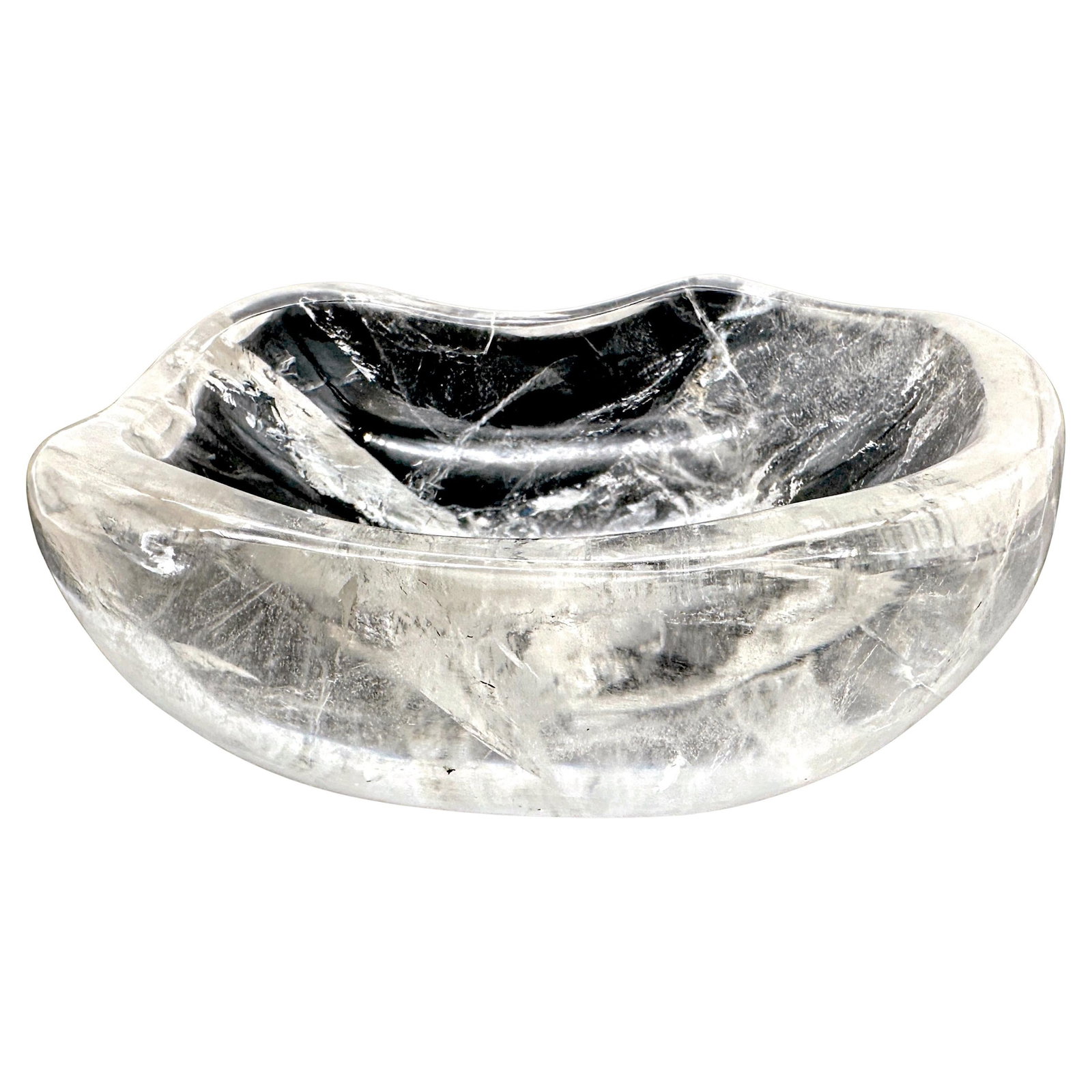 French 1970s Hand-Carved Rock Crystal Organic Bowl: French 1970s Hand-Carved Rock Crystal Organic Bowl This exquisite French Modern bowl is masterfully hand-carved from a single piece of natural rock crystal, showcasing its stunning translucency, uniqu