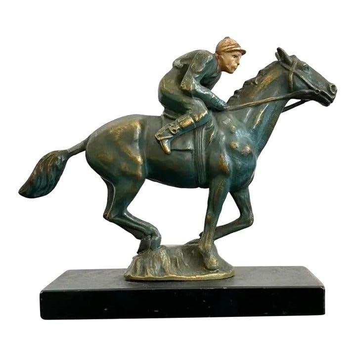 Metal Equestrian Horse With Jockey Figure Mid Century Verdigris Sculpture: Metal Equestrian Horse With Jockey Figure Mid Century Verdigris Sculpture This vintage mid-20th century sculpture features an equestrian figure with a rider poised confidently atop a striding horse. T