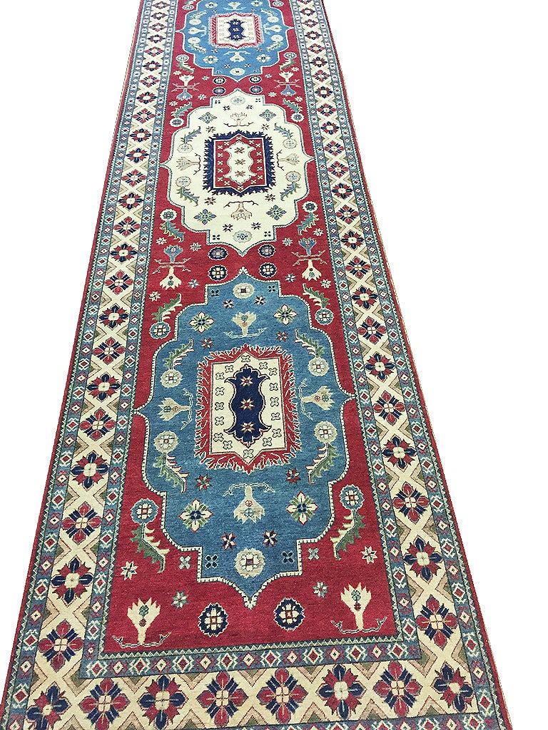 Red Yakash Kazak Hand-Knotted Wool Rug 58 x 238 Intricate Geometric Design: Red Yakash Kazak Hand-Knotted Wool Rug 58 x 238 Intricate Geometric Design Free continental US Shipping Transform your space with this stunning 4.10 x 19.10 Red Yakash Kazak Rug, a true embodiment of 