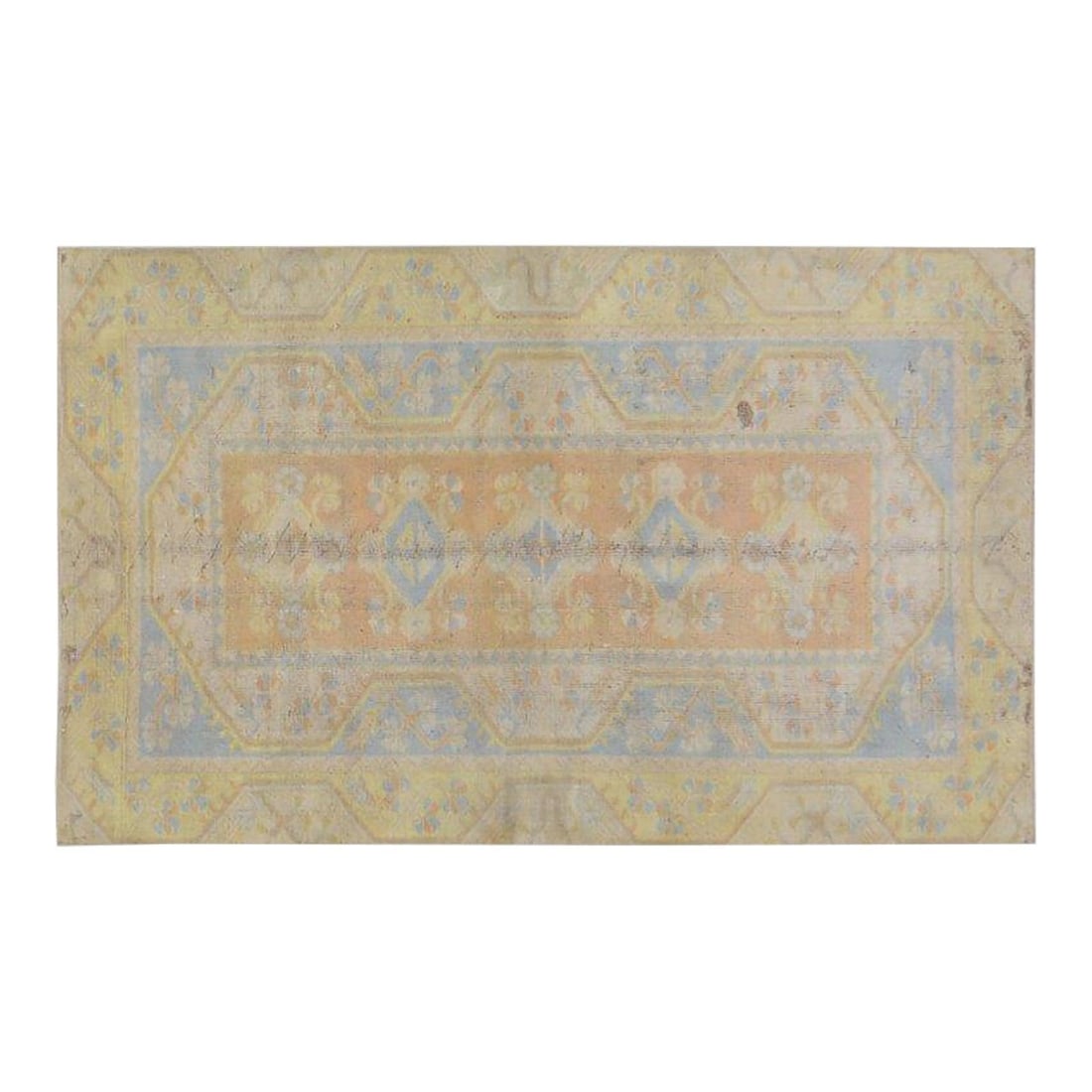 3'7" x 5'10" Hand-Knotted Wool Anatolian Rug in Apricot: 3'7" x 5'10" Hand-Knotted Wool Anatolian Rug in Apricot This vintage Turkish Anatolian hand-knotted wool rug is crafted using traditional techniques, blending timeless artistry with a modern design se