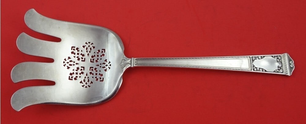 Tiffany & Co San Lorenzo Sterling Silver Serving Fork 9 3/4": Tiffany & Co San Lorenzo Sterling Silver Serving Fork 9 3/4" This exquisite San Lorenzo asparagus serving fork by Tiffany & Co. showcases the elegance of sterling silver craftsmanship. Measuring 9 3/4