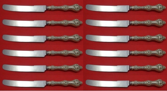 Set of 12 Alvin Old Orange Blossom Sterling Silver Dinner Knives 9 3/4": Set of 12 Alvin Old Orange Blossom Sterling Silver Dinner Knives 9 3/4" This exquisite set of 12 dinner knives features the elegant Old Orange Blossom pattern by Alvin/Gorham. Each knife is crafted fr