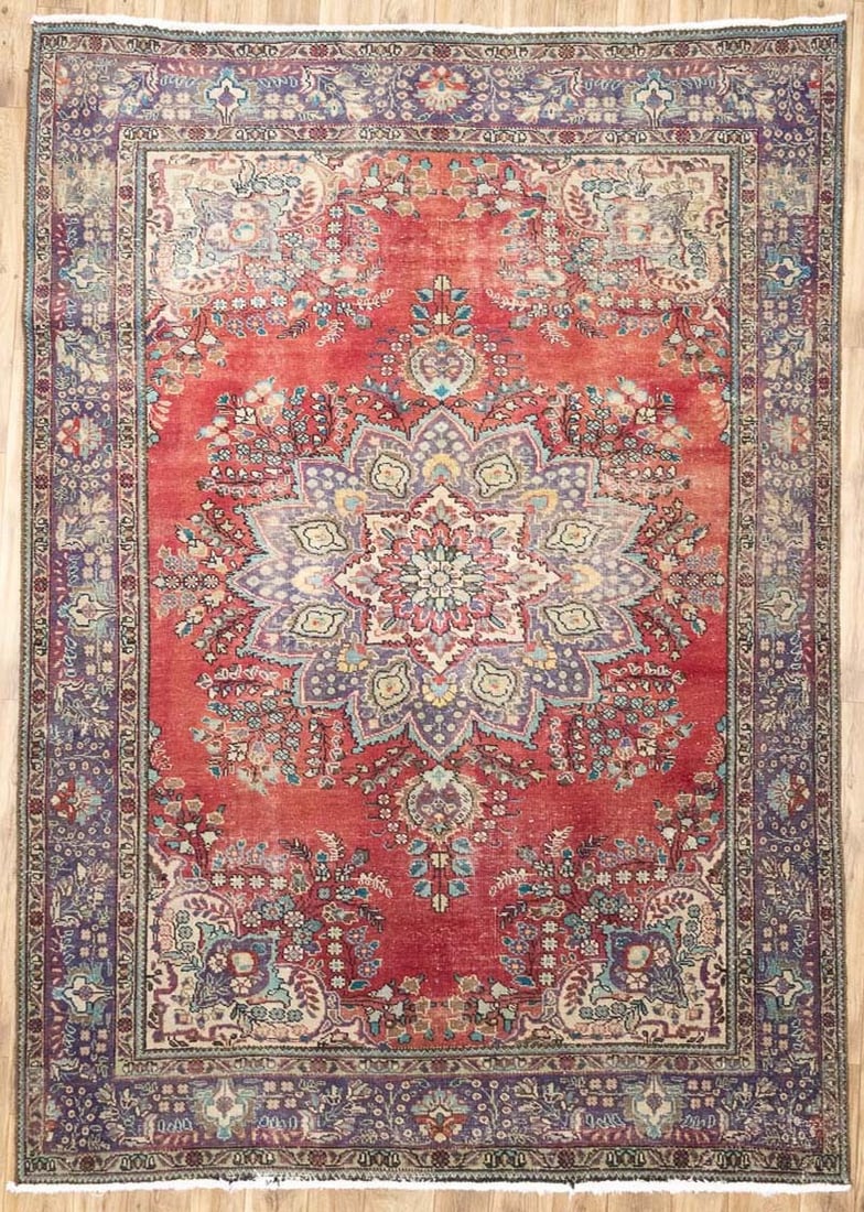 Hand Knotted Wool Floral Oriental Area Rug 6'11 x 9'9: Hand Knotted Wool Floral Oriental Area Rug 6'11 x 9'9 This semi-antique hand-knotted Oriental rug features a classic floral pattern in muted shades of red, purple, cream, brown, and light blue. Crafte