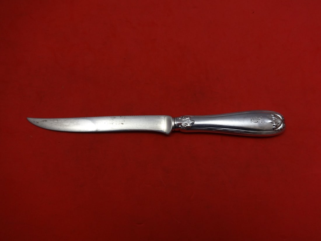 Tiffany & Co Colonial Sterling Silver Serrated Citrus Knife 7 3/8 in: Tiffany & Co Colonial Sterling Silver Serrated Citrus Knife 7 3/8 in This exquisite Colonial citrus knife by Tiffany & Co. showcases a serrated blade and a hollow handle, crafted from high-quality ste