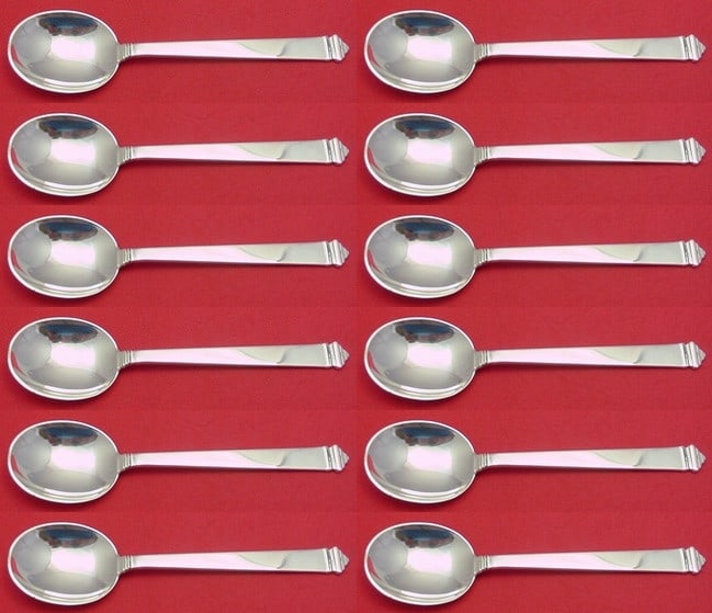Tiffany & Co Hampton Sterling Silver Cream Soup Spoon Set 12 pcs 7": Tiffany & Co Hampton Sterling Silver Cream Soup Spoon Set 12 pcs 7" This elegant 12-piece set of cream soup spoons from the renowned Hampton pattern by Tiffany & Co. showcases the timeless beauty and 