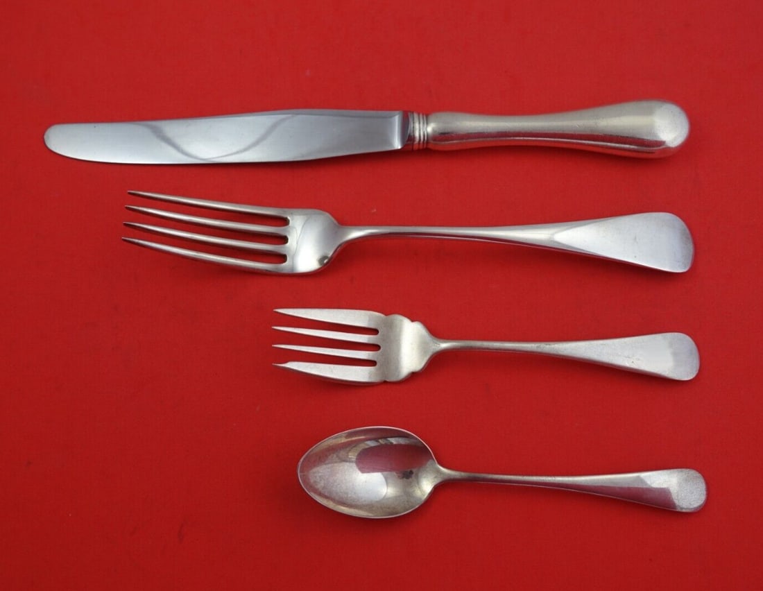Birks Old English 4 Piece Sterling Silver Dinner Place Setting: Birks Old English 4 Piece Sterling Silver Dinner Place Setting This 4-piece Old English by Birks place setting is made of sterling silver and includes a dinner knife with a hollow handle and stainless