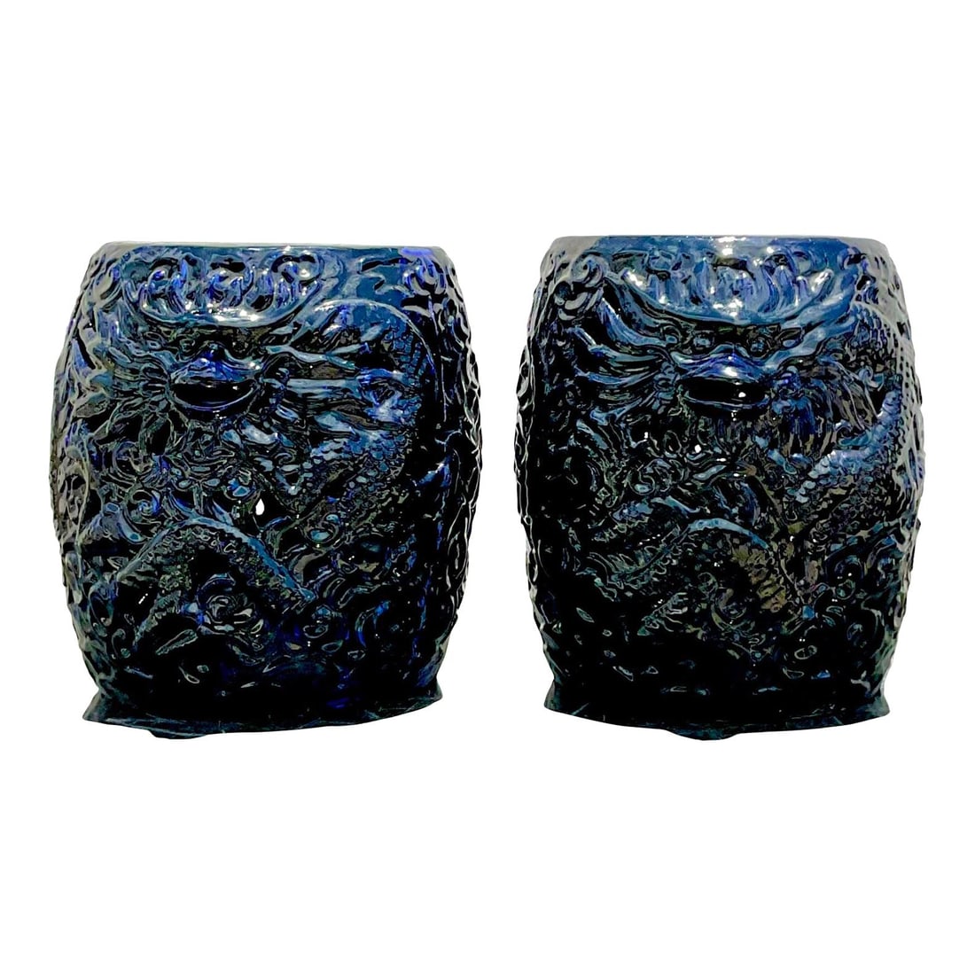 Pair of Vintage Ink Blue Ceramic Dragon Stools: Pair of Vintage Ink Blue Ceramic Dragon Stools Enhance your space with this stunning pair of vintage Boho glazed ceramic dragon stools. Featuring a captivating inky blue color adorned with an intricat