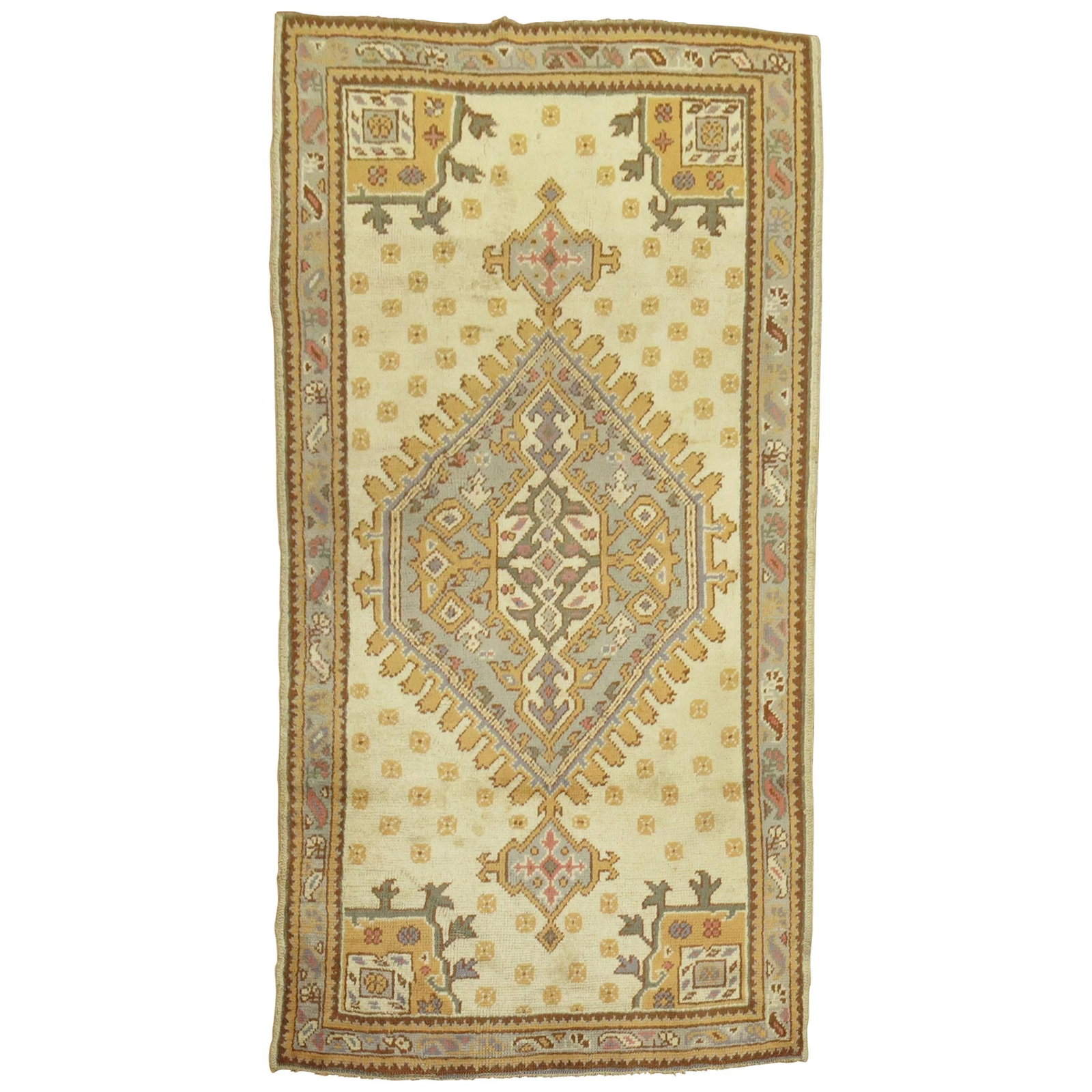 20th Century Turkish Oushak Wool Hand-Woven Medallion Rug 48 x 83 in: 20th Century Turkish Oushak Wool Hand-Woven Medallion Rug 48 x 83 in This is an early 20th century antique Turkish Oushak rug featuring a large medallion design. Hand-woven from wool, this traditional
