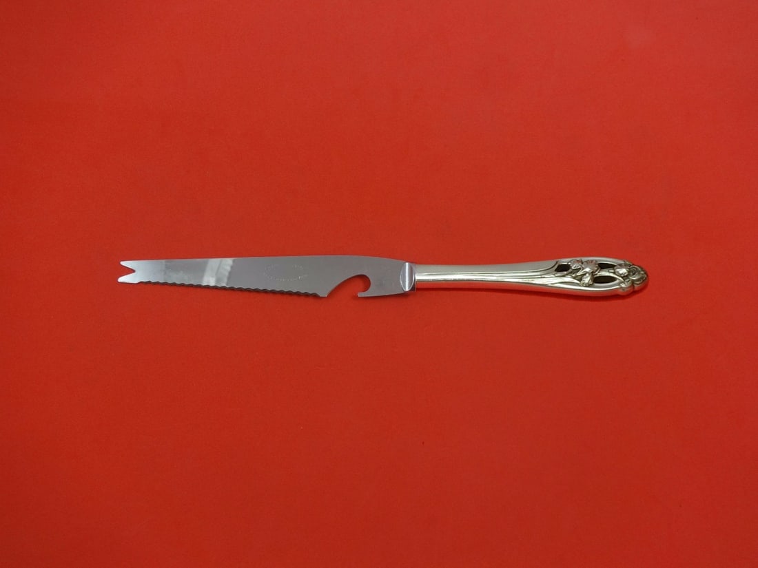 Custom Made Sterling Silver Bar Knife Silver Iris International 9 1/8": Custom Made Sterling Silver Bar Knife Silver Iris International 9 1/8" This exquisite bar knife features the elegant Silver Iris pattern by International Sterling. Crafted from high-quality sterling s