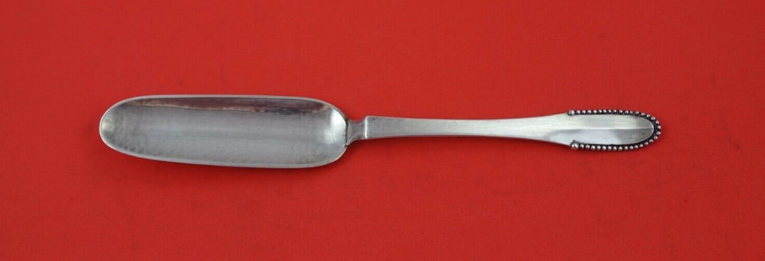 Georg Jensen Beaded Sterling Silver Jelly Knife 7 Inch: Georg Jensen Beaded Sterling Silver Jelly Knife 7 Inch This exquisite 7" jelly knife, crafted by Georg Jensen, showcases the elegant Beaded pattern. Made from high-quality sterling silver, this heirlo