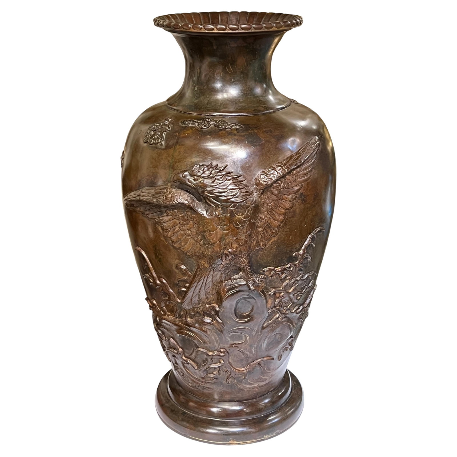 Meiji Period Japanese Bronze Vase Featuring Raised Eagle Motif: Meiji Period Japanese Bronze Vase Featuring Raised Eagle Motif This impressive antique Japanese bronze vase from the Meiji period features a striking brown patina and showcases a detailed relief of a 