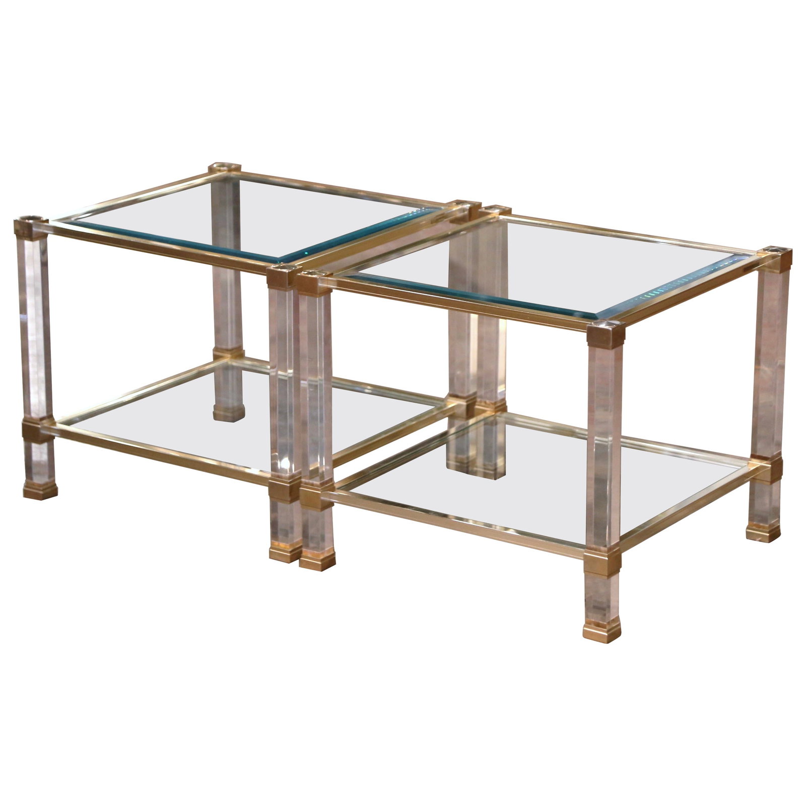 Set of Two French Lucite and Glass Mid-Century Modern Side Tables: Set of Two French Lucite and Glass Mid-Century Modern Side Tables This pair of mid-century modern French side tables, attributed to Pierre Vandel, dates to circa 1970. Each table features a striking c