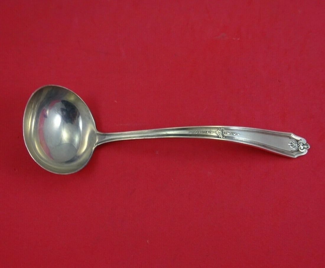 Alvin Gainsborough Sterling Silver Gravy Ladle 7 1/8 Inches: Alvin Gainsborough Sterling Silver Gravy Ladle 7 1/8 Inches Enhance your dining experience with this elegant Gainsborough gravy ladle by Alvin. Crafted from high-quality sterling silver, this ladle me