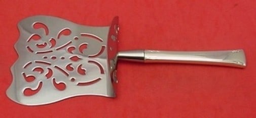 International Sterling Serenity Asparagus Server 9.5" Hooded Handle: International Sterling Serenity Asparagus Server 9.5" Hooded Handle This exquisite asparagus server is from the Serenity pattern by International Sterling. Crafted from sterling silver, it features a 