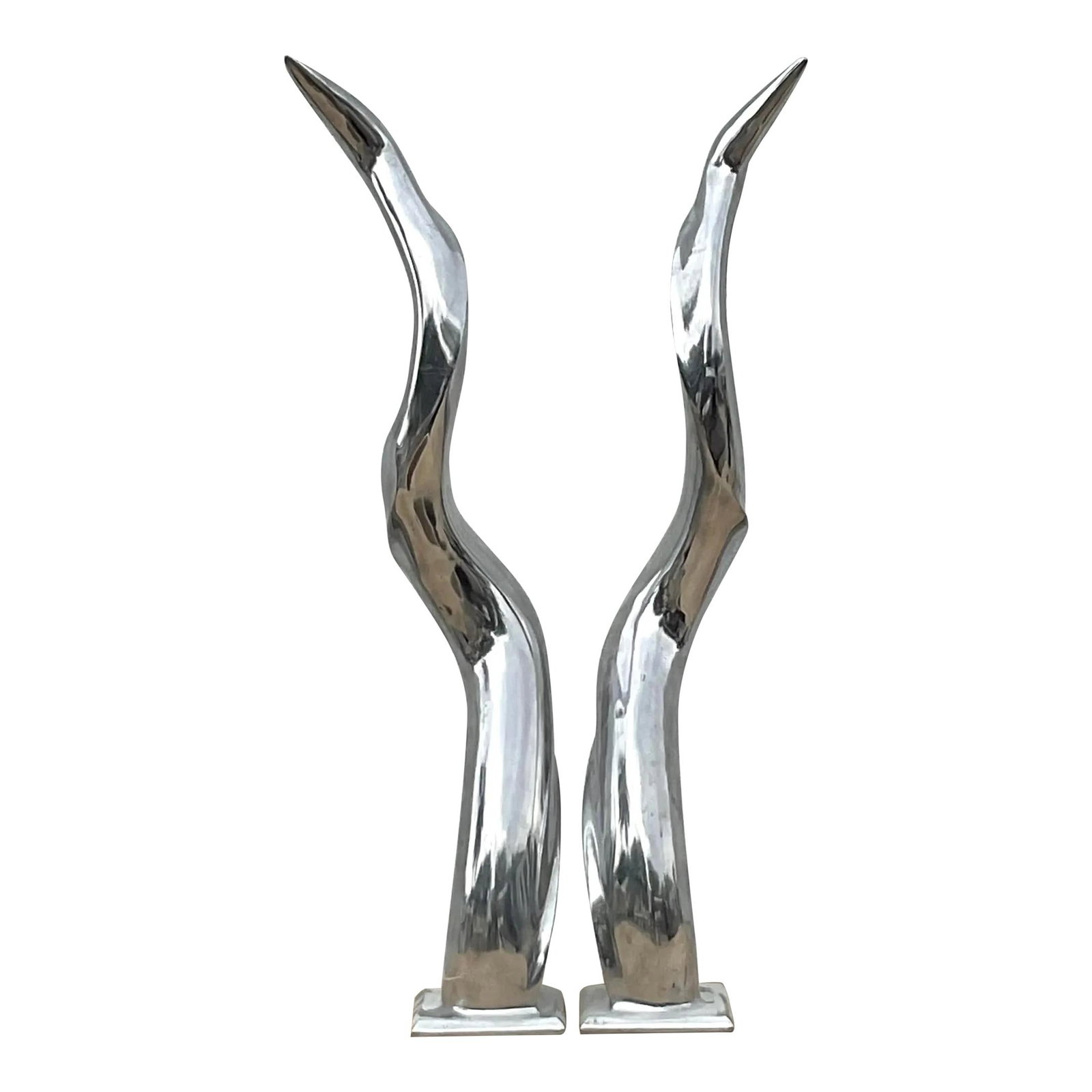 Rare Vintage Polished Chrome Antlers Pair 33.5in Tall: Rare Vintage Polished Chrome Antlers Pair 33.5in Tall Make a bold, sculptural statement with this rare pair of vintage polished chrome antlers. Featuring fluid, flame-like curves and a gleaming mirror