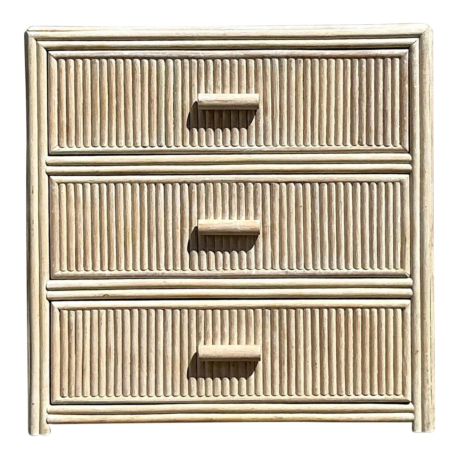 Vintage Washed Rattan Chest of Drawers: Vintage Washed Rattan Chest of Drawers This vintage coastal chest of drawers showcases a washed rattan finish that beautifully blends beachy charm with practical storage solutions. The textured rattan