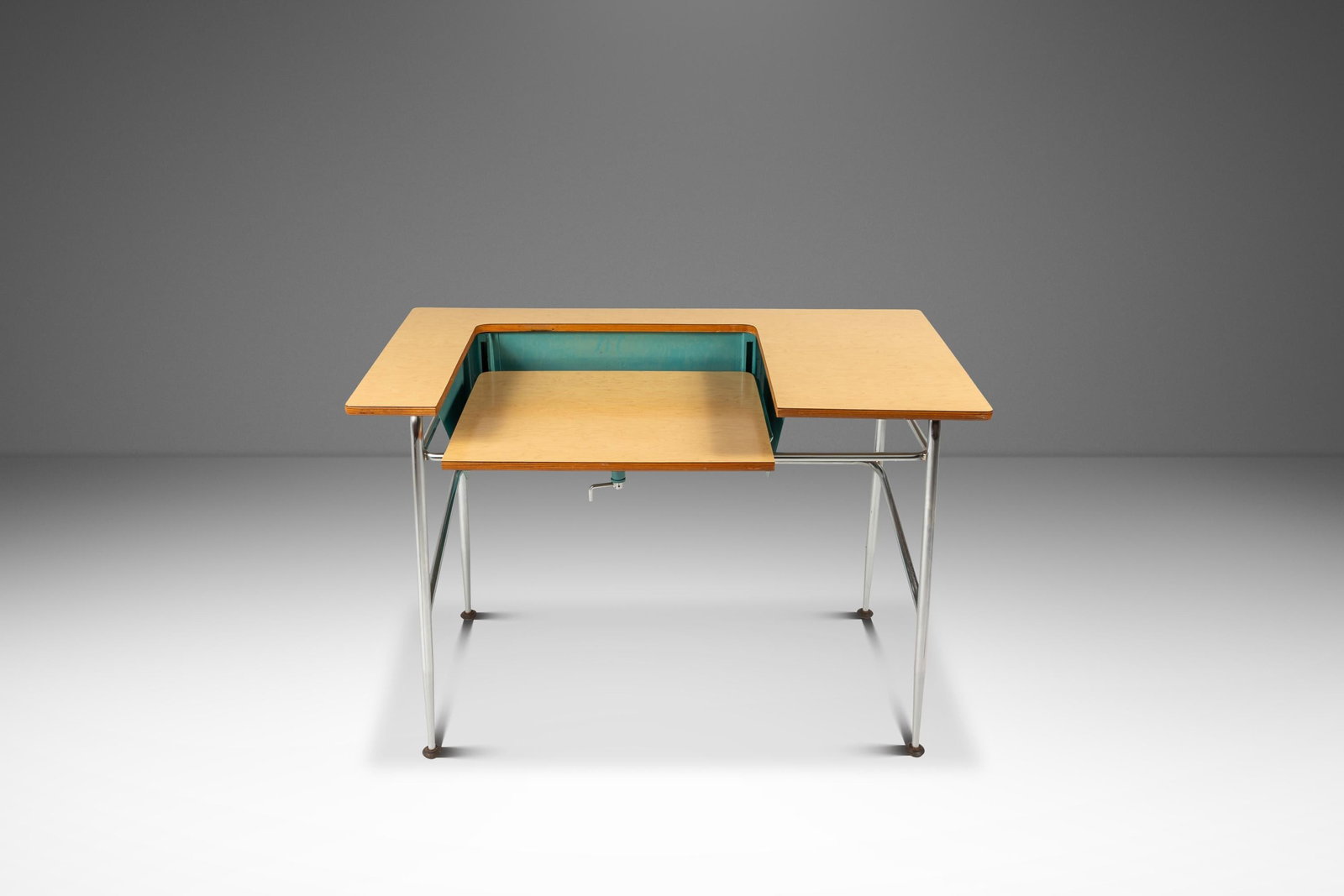 Adjustable Height Chrome Metal Writing Desk USA 1970s: Adjustable Height Chrome Metal Writing Desk USA 1970s Mid-Century Modern industrial writer's desk / computer desk from the United States, circa 1970s. It features an adjustable-height desk top that ca