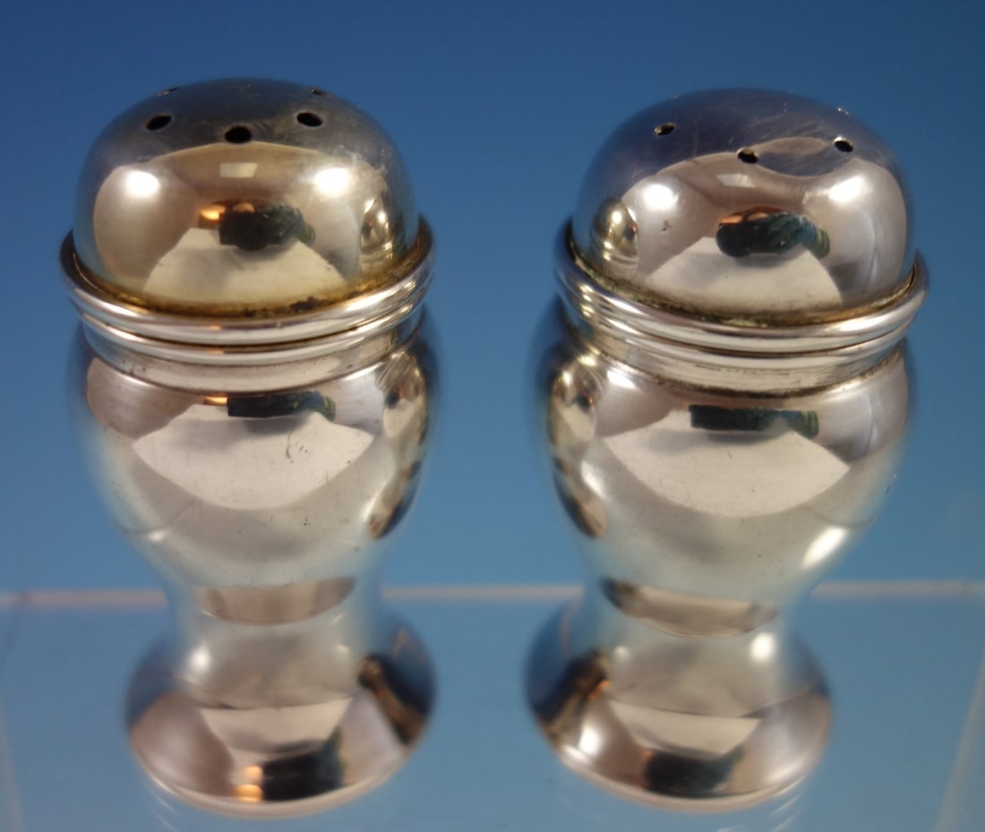 Tiffany & Co Padova Sterling Silver Salt and Pepper Shakers 2pc: Tiffany & Co Padova Sterling Silver Salt and Pepper Shakers 2pc Enhance your dining experience with this exquisite 2-piece set of Padova salt and pepper shakers by Tiffany & Co. Crafted from high-qual