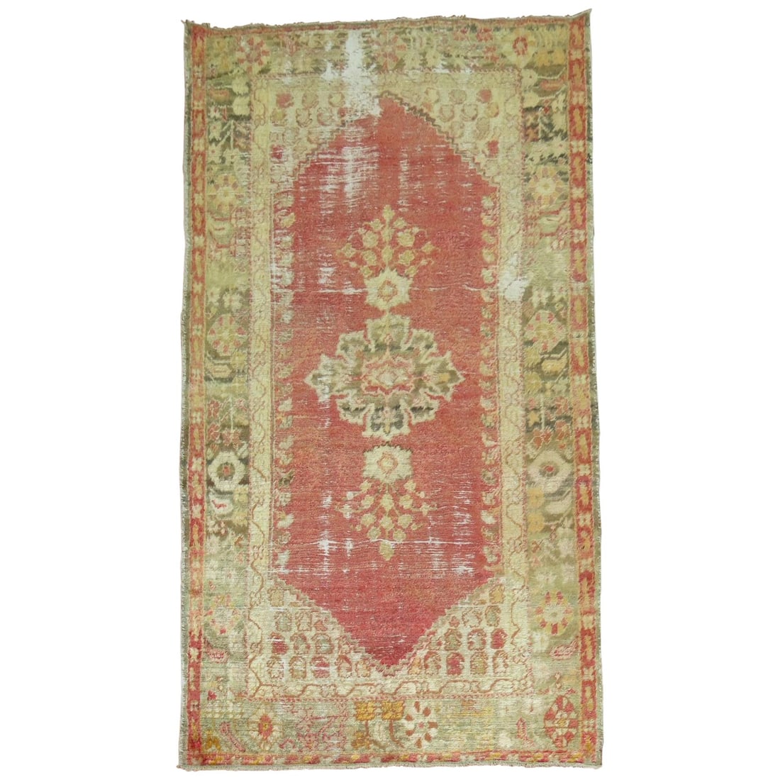 Early 20th Century Angora Wool Oushak Rug 53 x 102 in: Early 20th Century Angora Wool Oushak Rug 53 x 102 in This early 20th century Oushak rug from Turkey is hand-woven from angora wool, featuring a soft watermelon-colored ground and an open field design