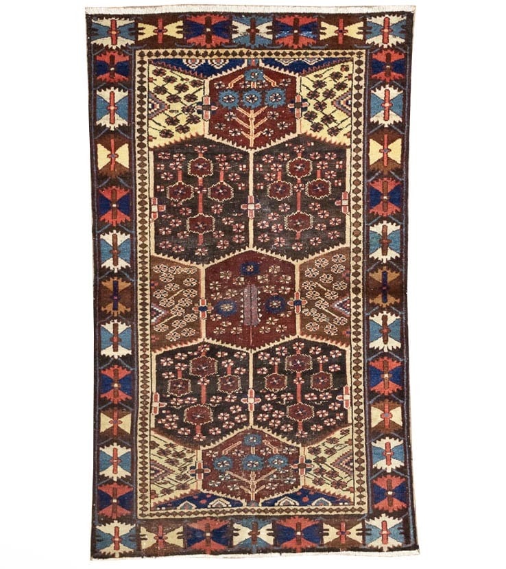 Hand-Knotted Wool Floral Oriental Area Rug 3'9 x 6'6: Hand-Knotted Wool Floral Oriental Area Rug 3'9 x 6'6 This semi-antique hand-knotted wool rug features a classic oriental floral pattern in cream, dark brown, blue, light red, and other complementary t