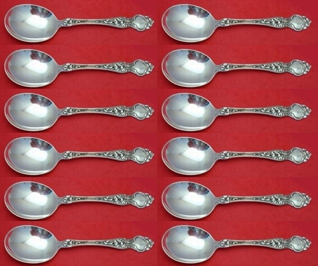 Wallace Violet Sterling Silver Cream Soup Spoon Set 12 Pieces: Wallace Violet Sterling Silver Cream Soup Spoon Set 12 Pieces This exquisite 12-piece cream soup spoon set in the elegant "Violet" pattern by Wallace is composed of high-quality sterling silver. Each 