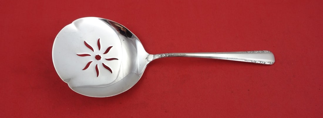 International Sterling Silver Courtship Tomato Server 8": International Sterling Silver Courtship Tomato Server 8" This exquisite tomato server features the elegant Courtship pattern by International Sterling. Crafted from high-quality sterling silver, this 